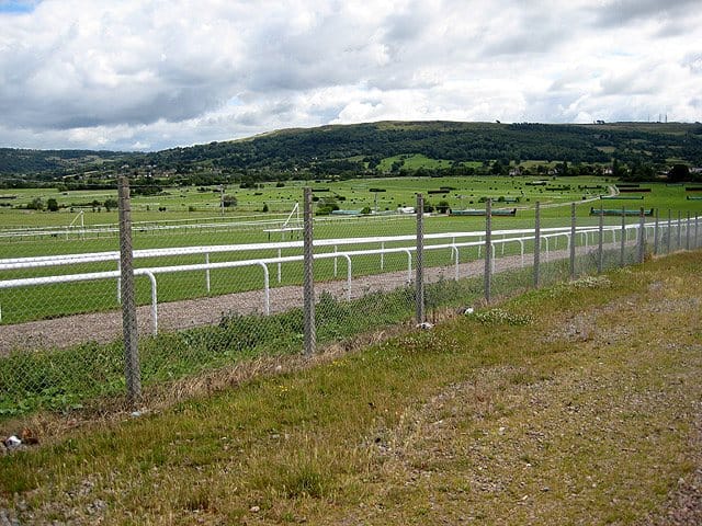 View over Cheltenham Racecourse with Cleeve Hill and the Cotswold Edge behind